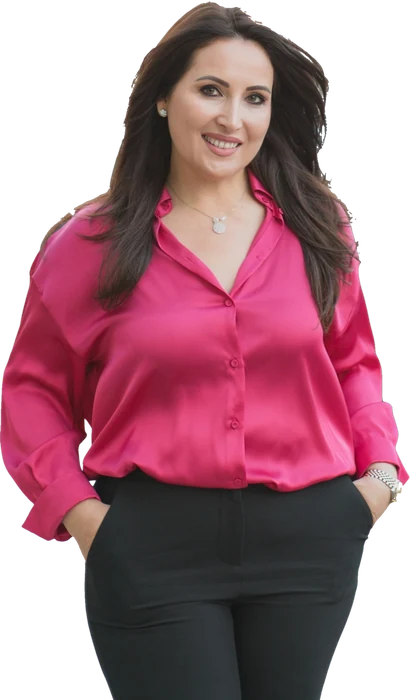 Shpresa Lita in a pink blouse
