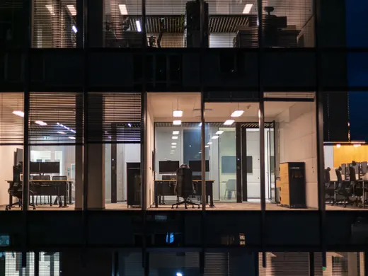 Modern offices lit at night